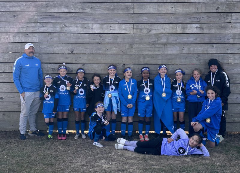 The 2015 girls’ team includes in back (l-r) coach Barry Ridgeway, Bristol O'Bier, Cora Hershelman, Ailany Esparza, Madysin Palmer, Reagan Valle, Delaney Pease, Yoysi Rivera-Niz, Maggie Lawrence, Tory Farrell, JoJo Massey and coach Shannon Anfuso. In front are Elliot Colbert, Ilean Meibaum and Lucy Ridgeway.